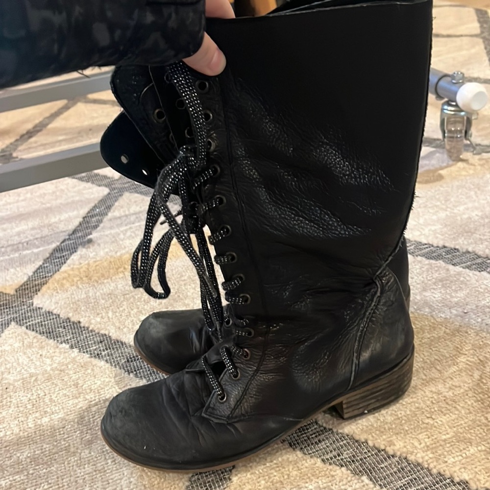 Black leather combat boots
